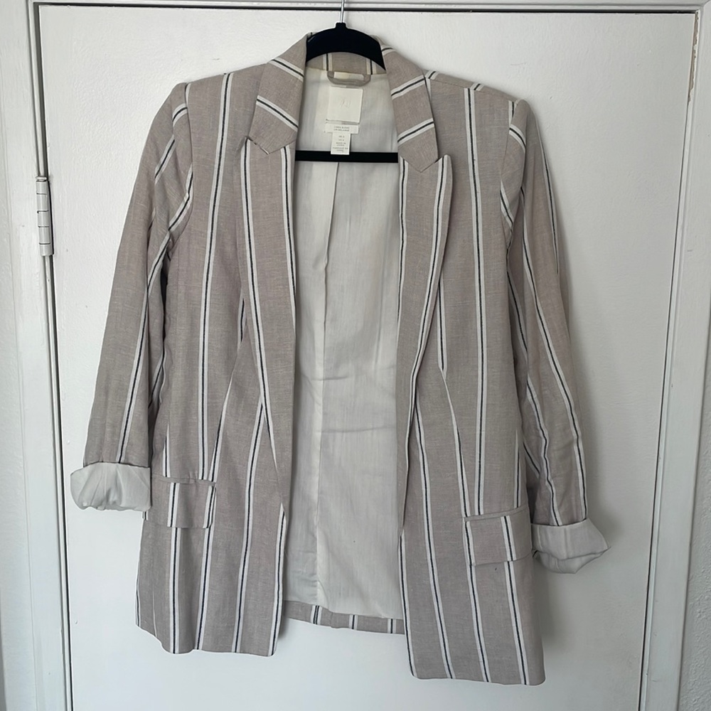 Tan linen blazer with gray and white strips.